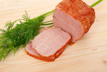 Appetizing part of smoked meat on dill,useful protein food