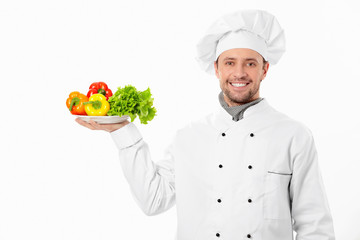 The cook with vegetables