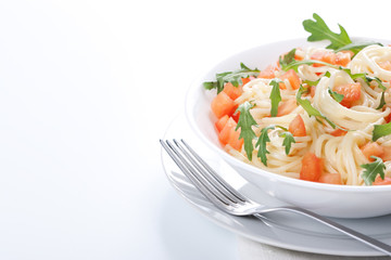 Pasta with tomato and rucola