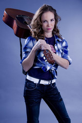 Beautiful woman with guitar.