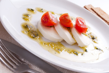 Mozzarella salat with pesto sauce