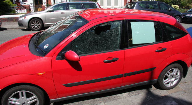 Smashed car window - car crime