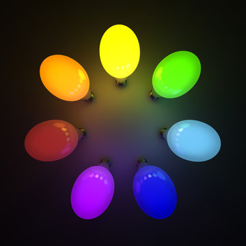 Colorful light bulbs over black background