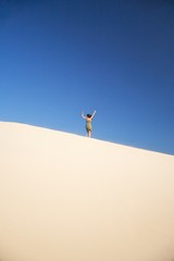 woman happy on great sand dune