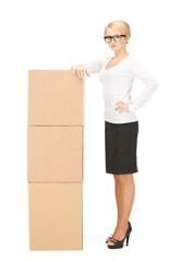 attractive businesswoman with big boxes.