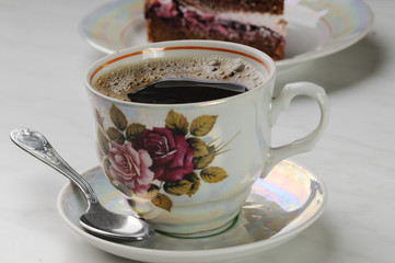 cup of coffee and a piece of cake