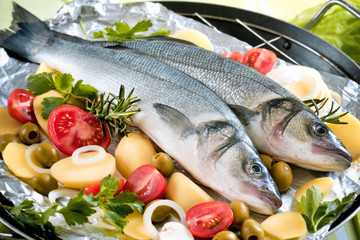 Sea-bass with the vegetables on a grill
