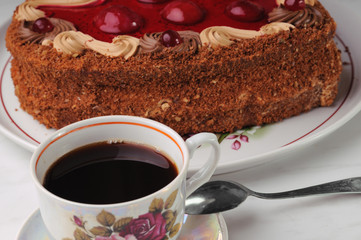 cup of coffee and a piece of cake