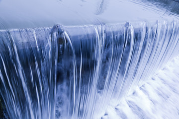 water cascade streaming down a lasher