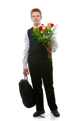 pupil of the senior classes  with a bouquet of flowers..