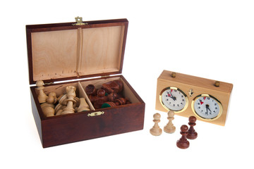 Chess pieces and a chess clock