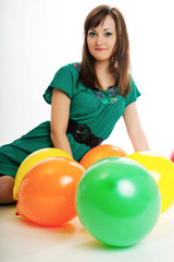 Fototapeta na wymiar Junge Frau mit Luftballons 469
