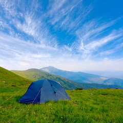 Tourists tent in mountain