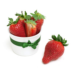 strawberries in glass tied with a green bow