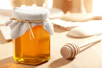 Honey with wood stick