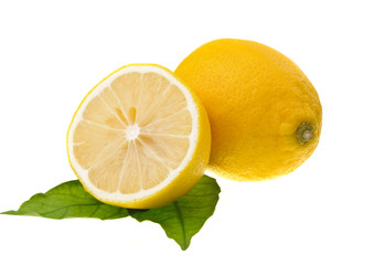 lemons on green leaf