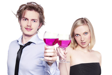 Young couple toasting with pink drink
