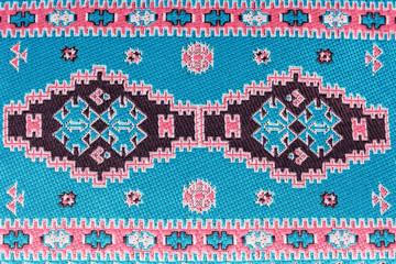 Closeup of seamless blue oriental embroidery pattern