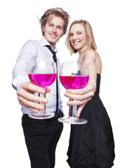 Young couple toasting with pink drink.
