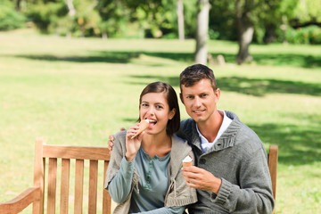 Fototapeta premium Young couple eating an ice cream