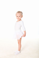 little girl doing gymnastics