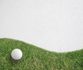 white Golf ball on green grass