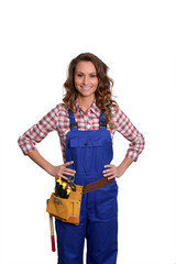 Woman carpenter standing on white background