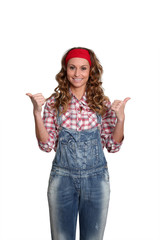 Obraz na płótnie Canvas Woman with blue jeans overalls standing on white background