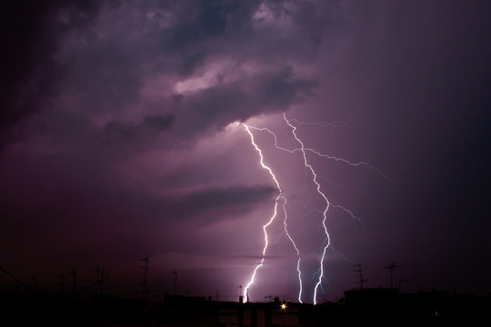 Lightning night and roofs