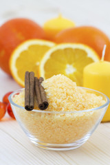 bowl of orange bath salt with fresh fruits - beauty treatment