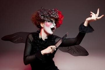 woman mime with knife