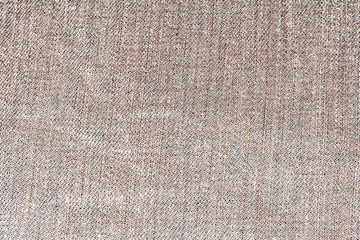closeup of seamless light brown denim fabric texture