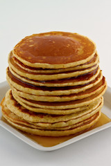 Stack of pancakes with syrup