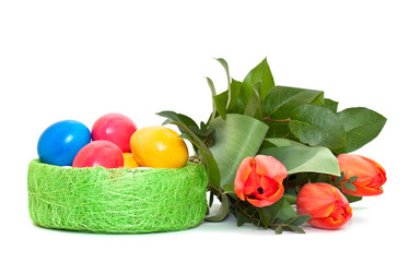 Easter eggs with a bouquet of tulips