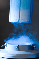 Opened container with liquid nitrogen, blue light