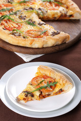 Pizza with mushroom and tomatoes