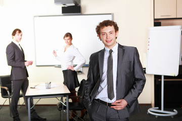 a young businessman in office