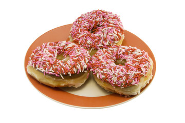 three sprinkled donuts