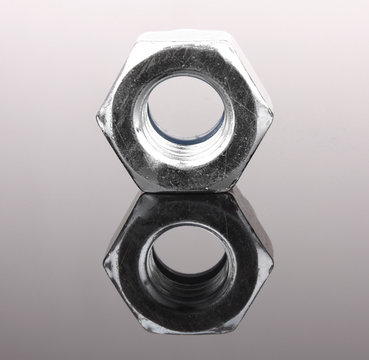 Bolt with reflection on grey background