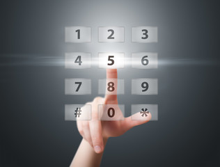 hand pressing digital button