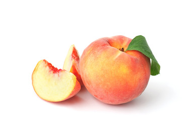 Fototapeta na wymiar Peaches on white