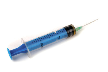 Fototapeta premium syringe with a medicine is isolated on a white background