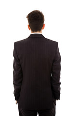young businessman from behind, isolated on white