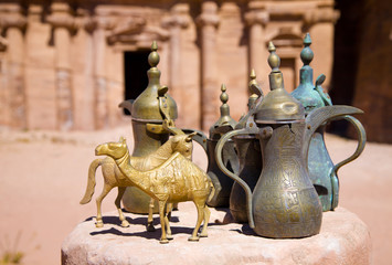 Brass jugs and animal figurines near the Monastery in Petra, Jor
