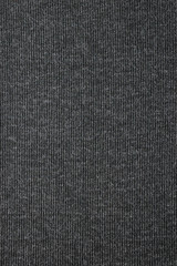 Fototapeta na wymiar Dark grey t-shirt fabric texture, vertical background