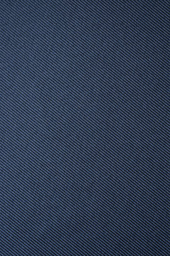 Dark blue fabric texture, vertical background
