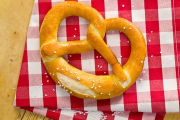 pretzel on checkered napkin