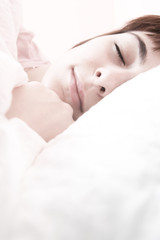 Fototapeta na wymiar Beautiful young woman sleeping.