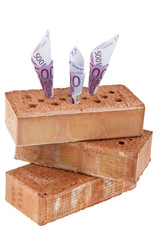 Hausbau, Finanzierung, Bausparen. Ziegel und Euro