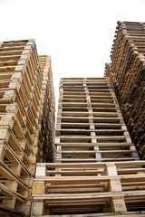 Isolated piles of wooden pallets